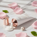 Simply Beautiful Satin Smooth Anti-Wrinkle Hand Cream rose gold tube on marble