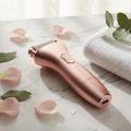 Simply Beautiful Electric Foot Callus Remover rose gold device on marble