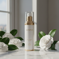 Simply Beautiful Daily Defense Moisturizer SPF 30 white and gold pump bottle on marble